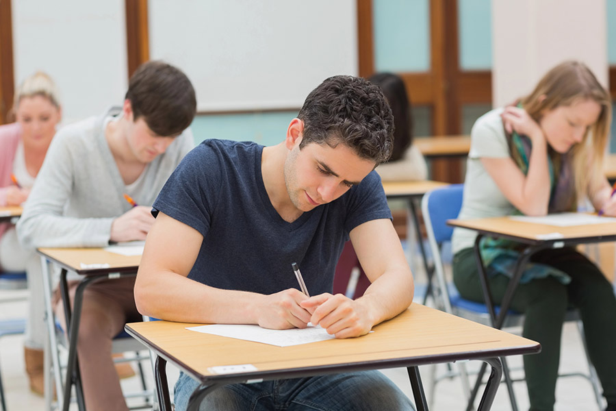 Students taking a test in a classroom in Detroit